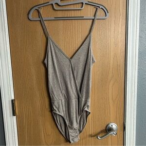 Tan Chemise with Plunging V-Neck and High-Cut Design